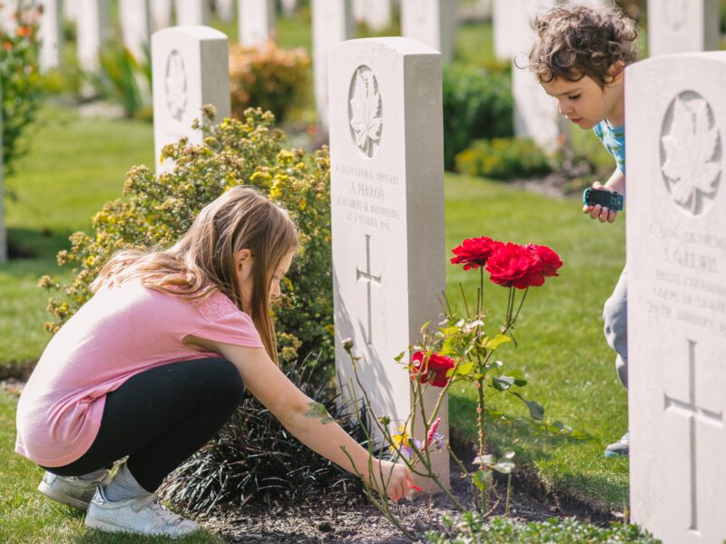 Girl visiting a Commonwealth War Grave