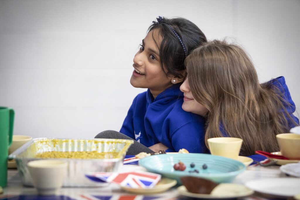 Two girls in a classroom