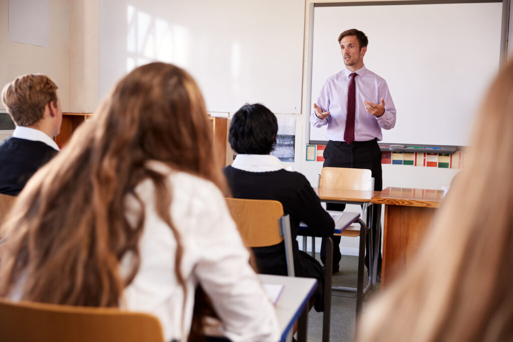 Teacher addressing classroom